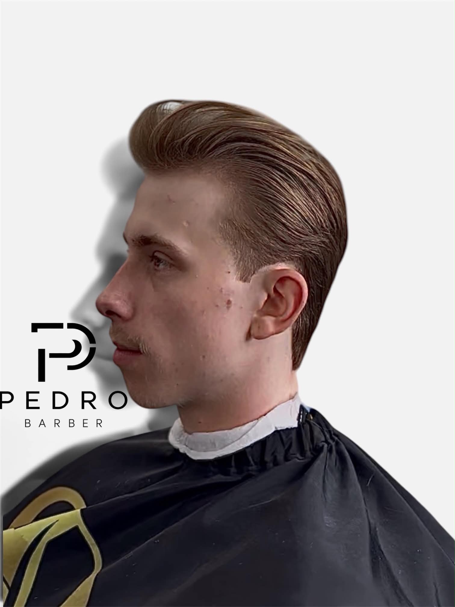 Side-swept pompadour, cut by Pedro